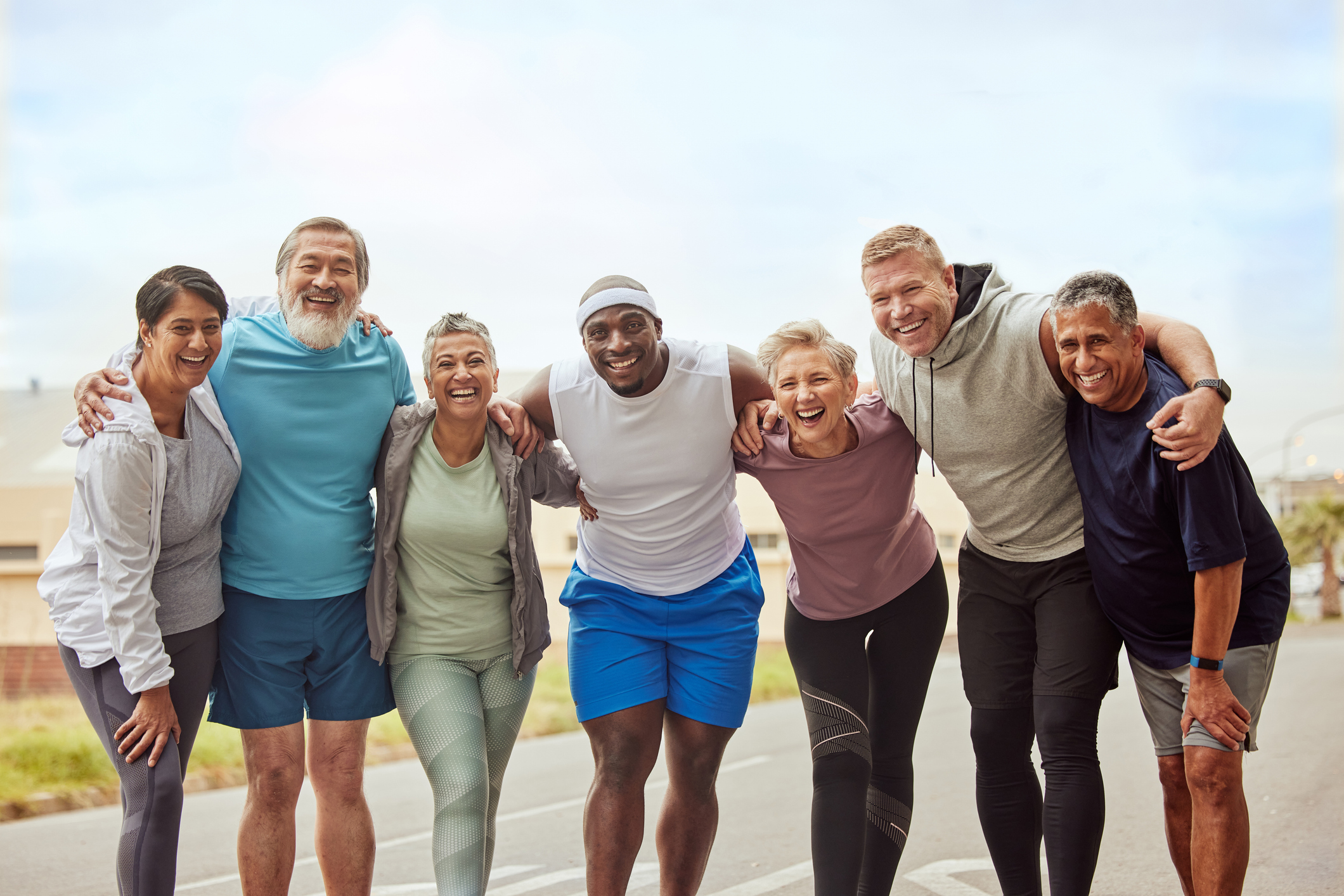 Group of people standing together after working out with these health tips